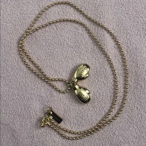 Marc Jacobs wrestling gloves necklace